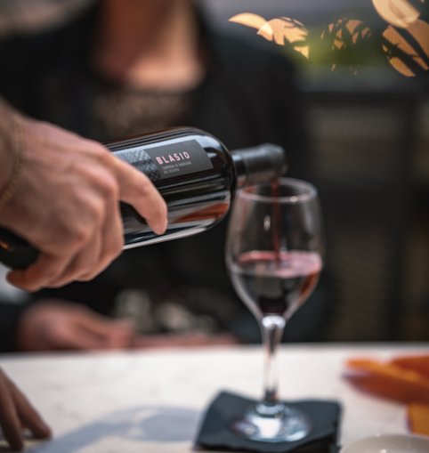 Pouring Blasio Cannonau di Sardegna Riserva into a wine glass