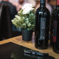 Blasio Cannonau di Sardegna Riserva bottle on table with corkscrew
