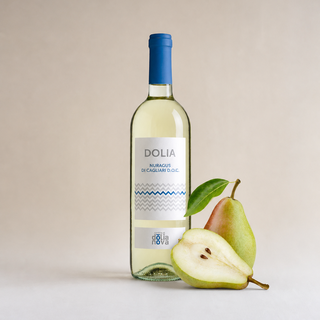 Dolia Nuragus di Cagliari DOC white wine with pear on a light background, fresh and delicate Sardinian wine