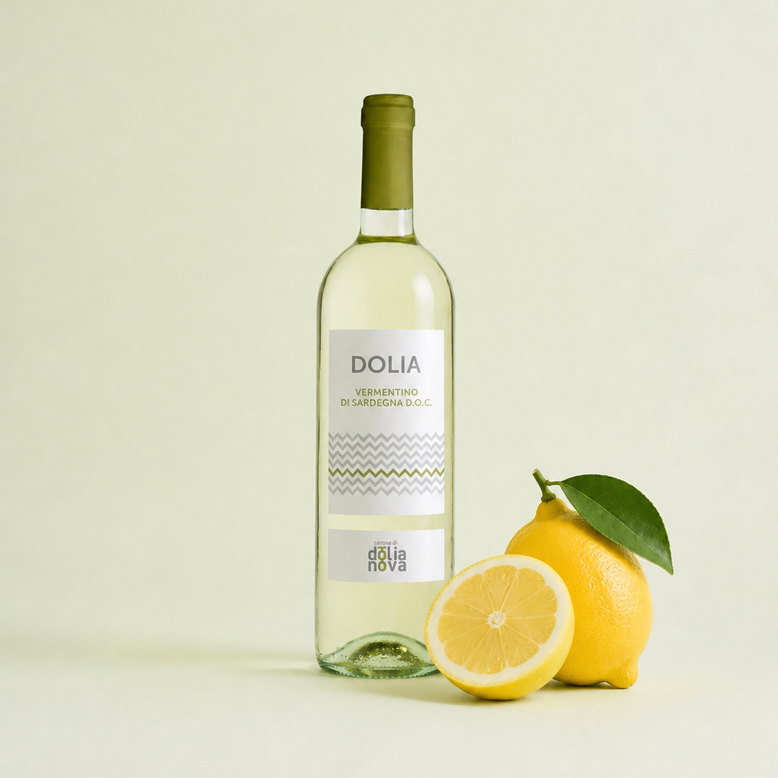 Dolia Vermentino di Sardegna DOC white wine with lemons on a light background, fresh citrus style Sardinian wine