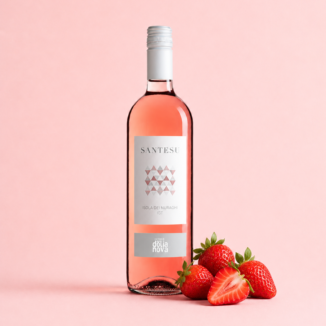 Santesu Rosato Sardinian rosé wine with strawberries on a soft pink background