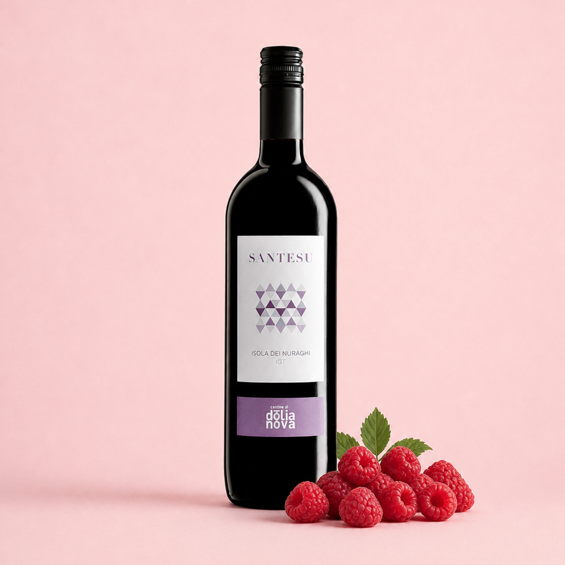 Santesu Rosso Sardinian red wine with raspberries on a pink background