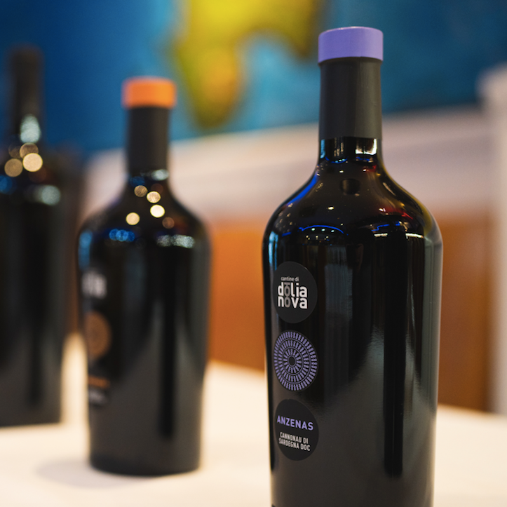 Anzenas Cannonau di Sardegna DOC wine bottle at tasting event