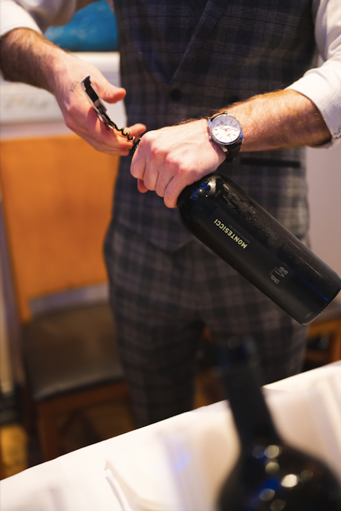 Opening Montesicci Nasco di Cagliari DOC white wine bottle